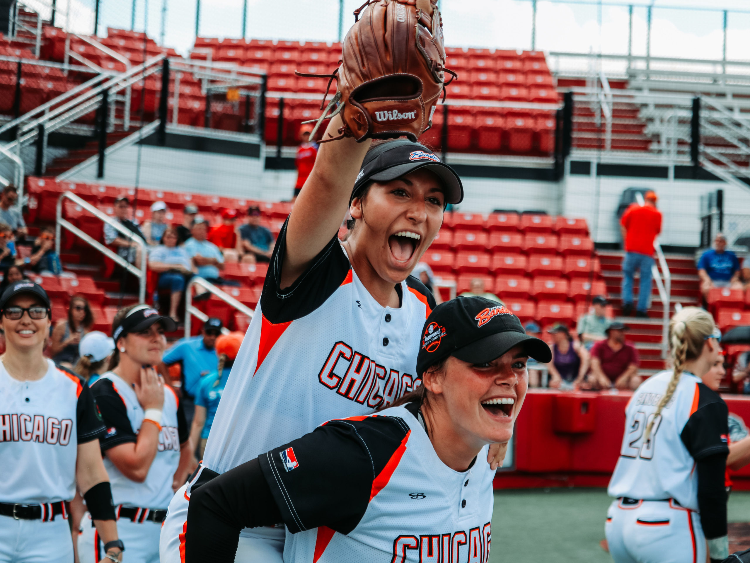 Abby Ramirez cheers on the back of Gwen Svekis.