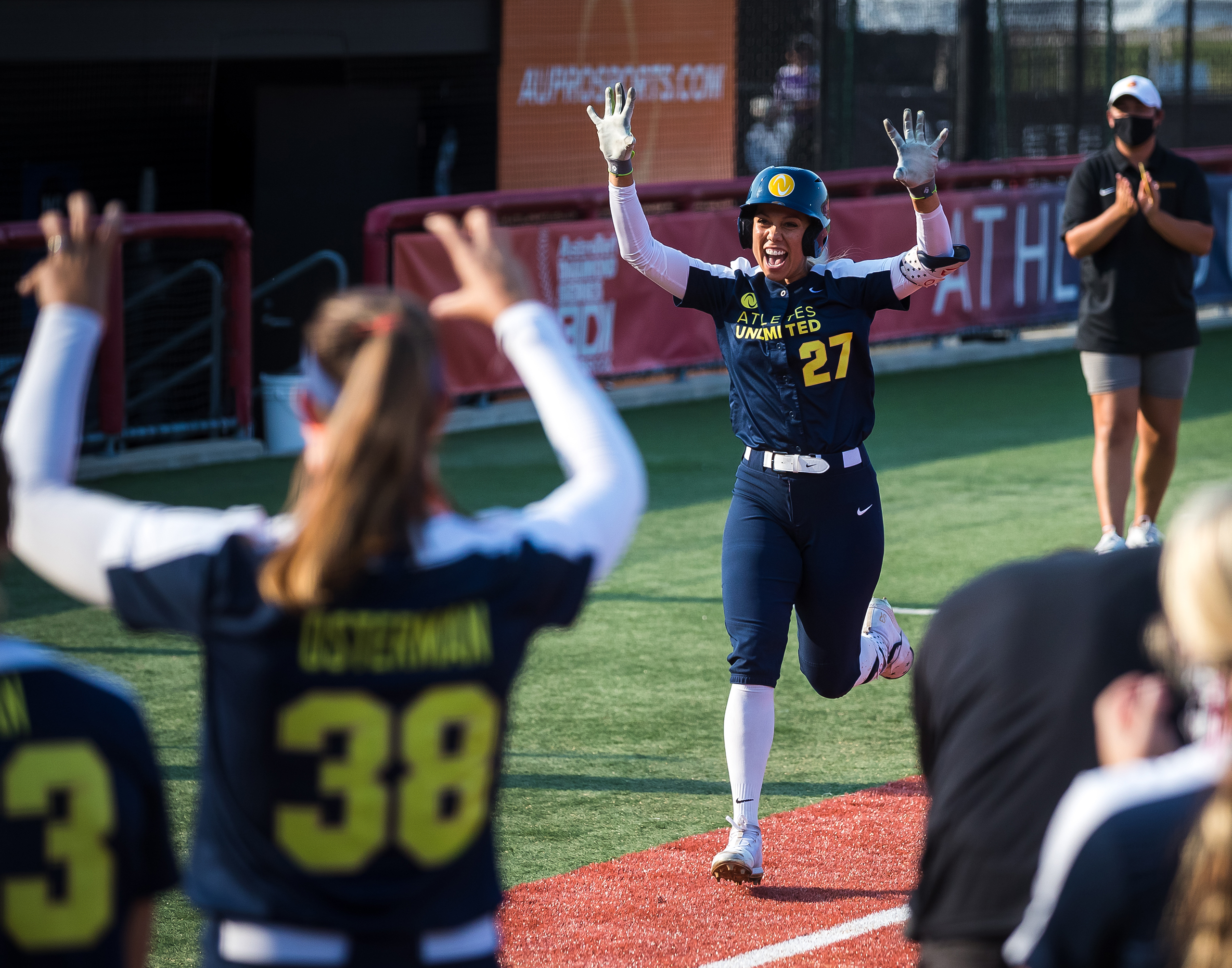 Sahvanna Jaquish heads towards home plate after hitting a home run.