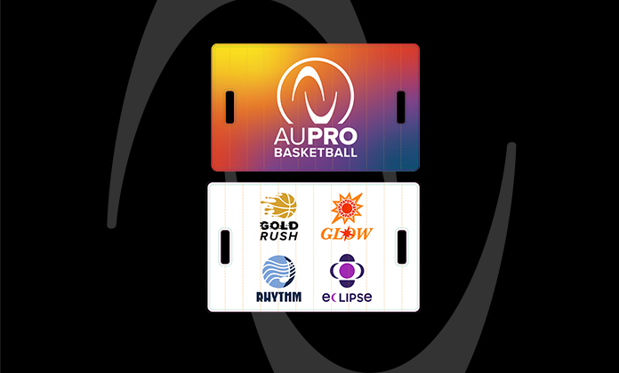 Two banner posters visible. One on top in gold, orange, blue, purple multicolor pattern with white 